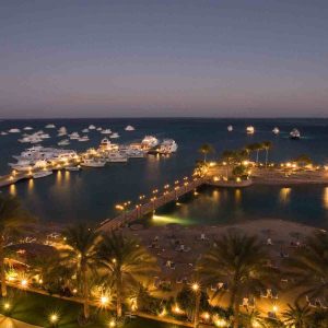 An aerial view of a marina at night in Hurghada.